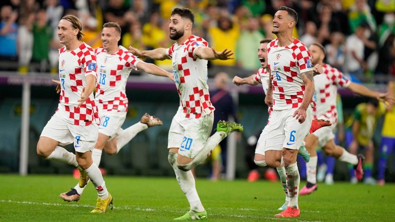 Croatia players celebrate after defeating Brazil on penalties