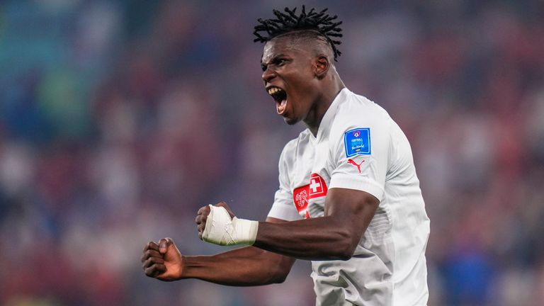 Breel Embolo celebrates after team-mate Remo Freuler scores Switzerland&#39;s third goal