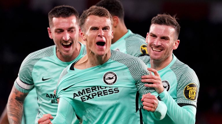 Solly March celebrates after putting Brighton 3-0 up against Southampton