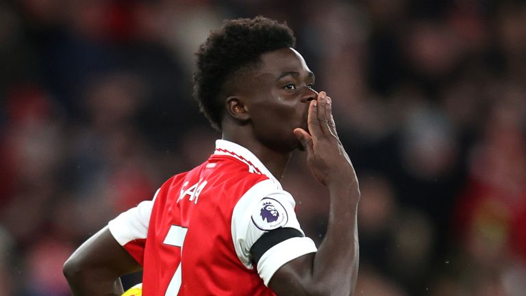 Saka celebrates his equaliser for Arsenal