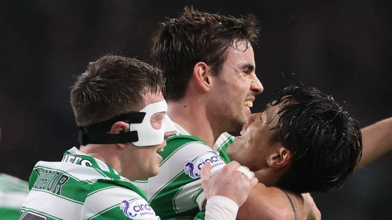 GLASGOW, SCOTLAND - FEBRUARY 02: Celtic's Matt O'Riley (centre) celebrates with Reo Hatate and Callum McGregor (left) during a cinch Premiership match between Celtic and Rangers at Celtic Park, on February 02, 2022, in Glasgow, Scotland. (Photo by Rob Casey / SNS Group)