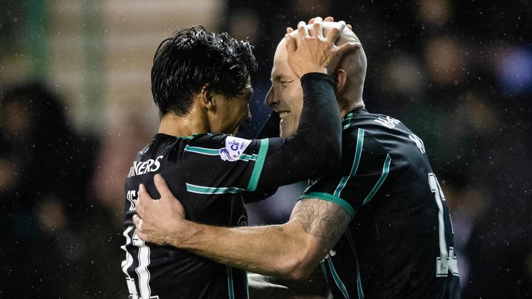 EDINBURGH, SCOTLAND - DECEMBER 28: Celtic's Aaron Mooy (R) celebrates making it 3-0 with Reo Hatate during a cinch Premiership match between Hibernian and Celtic at Easter Road, on December 28, 2022, in Edinburgh, Scotland.  (Photo by Craig Williamson / SNS Group)
