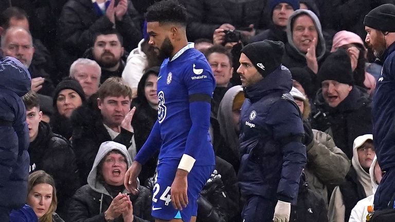 Reece James is forced off by an injury early in the second half