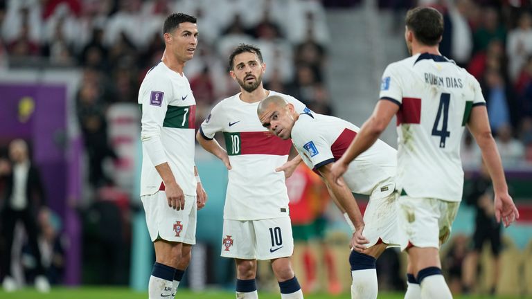 Portugal's Cristiano Ronaldo, Bernardo Silva and Pepe in discussion before a free kick