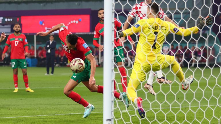 Achraf Dari heads home Morocco's equaliser against Croatia