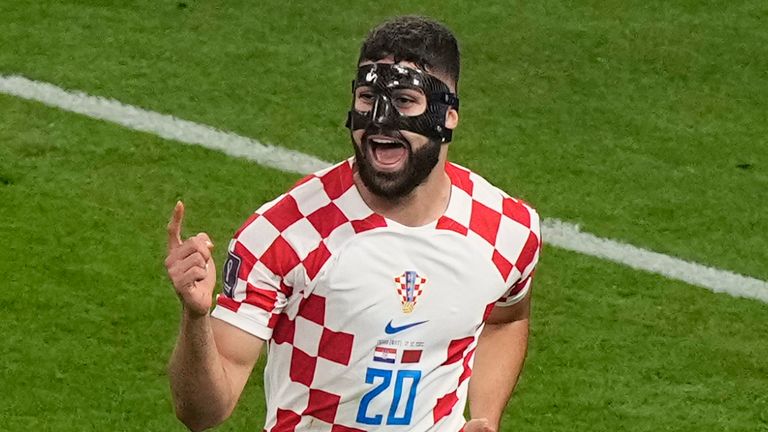 Joško Guardiol celebrates after opening the scoring for Croatia in the play-off for third place in the World Cup