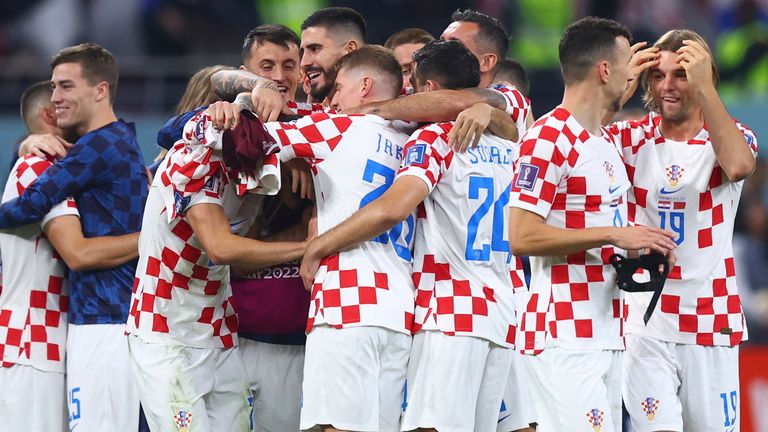 Croatian football players celebrate after the victory over Morocco in the play-off for third place in the World Cup