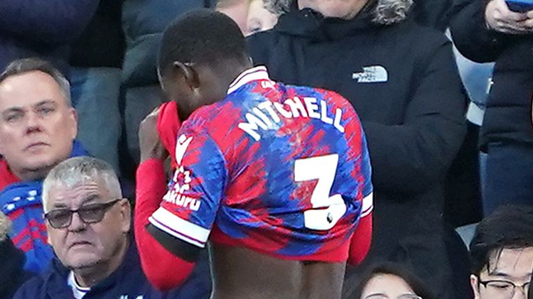 Tyrick Mitchell walks off the pitch after being sent off against Fulham