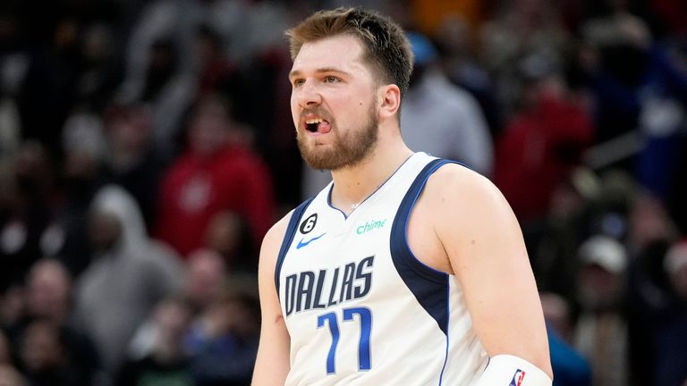 Luka Doncic reacts after making a 3-point basket during the second half of the win against the Houston Rockets.