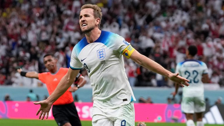 Harry Kane celebrates after scoring England's second goal against Senegal