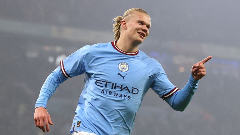 Man City's Erling Haaland celebrates after scoring against Liverpool