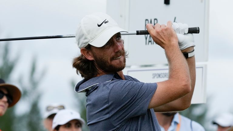 Tommy Fleetwood, of England, watches his shot on the first tee during the first round of the Hero World Challenge PGA Tour at the Albany Golf Club, in New Providence, Bahamas, Thursday, Dec. 1, 2022. (AP Photo/Fernando Llano)