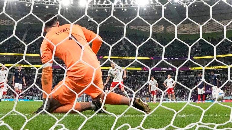 Robert Lewandowski scores a re-taken penalty against France