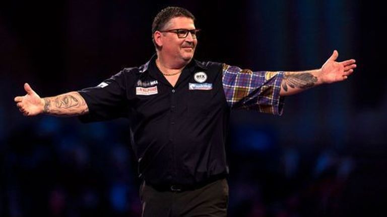 Gary Anderson celebrates beating Luke Humphries (not in picture) during day fourteen of the William Hill World Darts Championship at Alexandra Palace, London. Picture date: Saturday January 1, 2022.