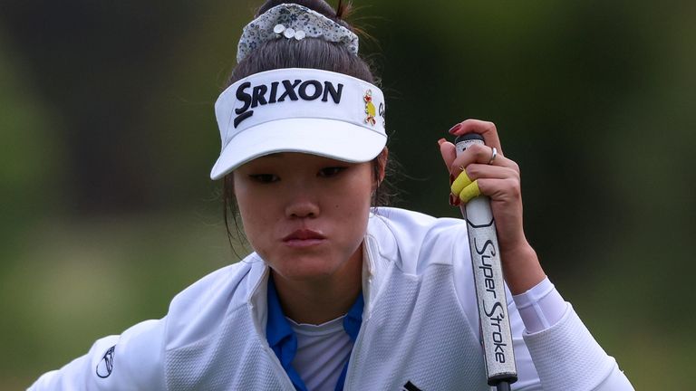 Australia's Grace Kim prepares to putt on the 12th hole during the Australian Open golf championship at Kingston Heath golf course in Melbourne, Australia, Thursday, Dec. 1, 2022. (AP Photo/Asanka Brendon Ratnayake)