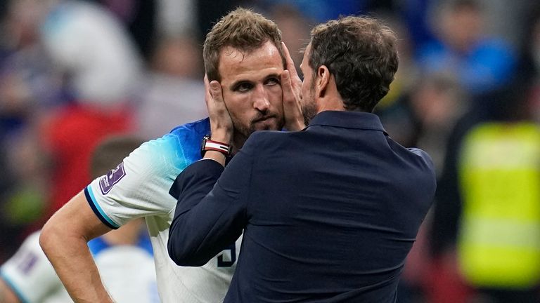 Harry Kane consoles himself with Gareth Southgate full time