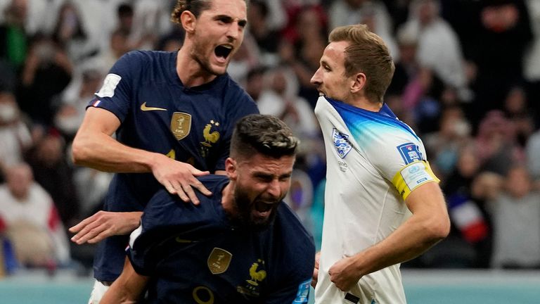 Adrien Rabiot and Olivier Giroud celebrate after Harry Kane misses a penalty