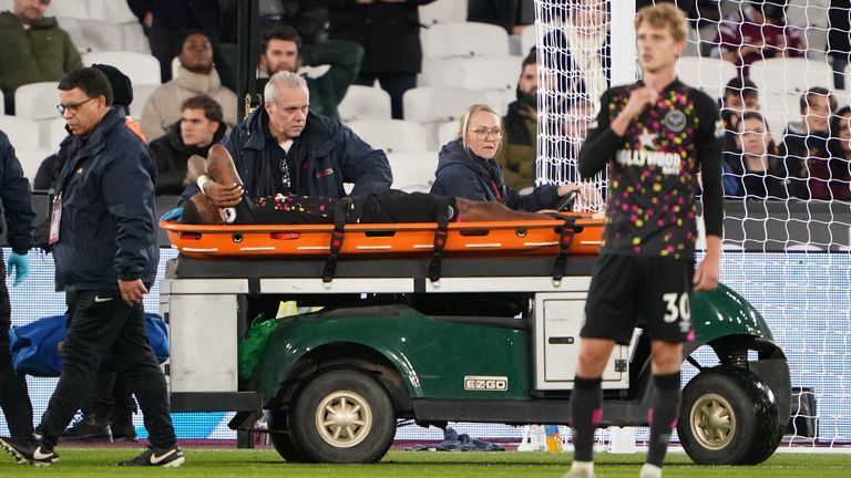 Brentford&#39;s Ivan Toney leaves the game on the stretcher after picking up an injury during the Premier League match at the London Stadium, London. Picture date: Friday December 30, 2022.