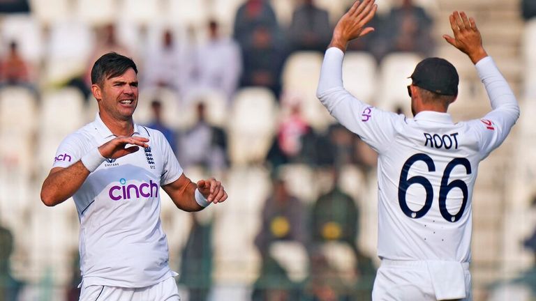 England&#39;s James Anderson celebrates with teammate after taking the wicket of Pakistan&#39;s Imam-ul-Haq during the first day of the second test cricket match between Pakistan and England, in Multan, Pakistan, Friday, Dec. 9, 2022. (AP Photo/Anjum Naveed)