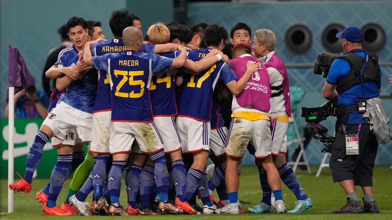 Japan players celebrate their equaliser