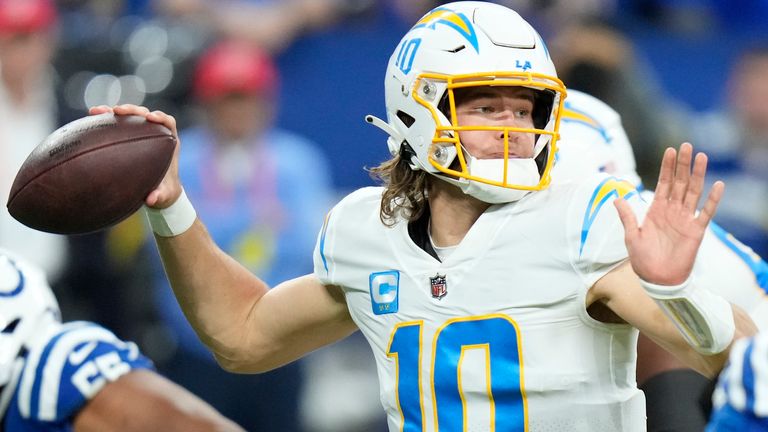 Los Angeles Chargers quarterback Justin Herbert (10) throws during the first half of an NFL football game against the Indianapolis Colts, Monday, Dec. 26, 2022, in Indianapolis. (AP Photo/AJ Mast)