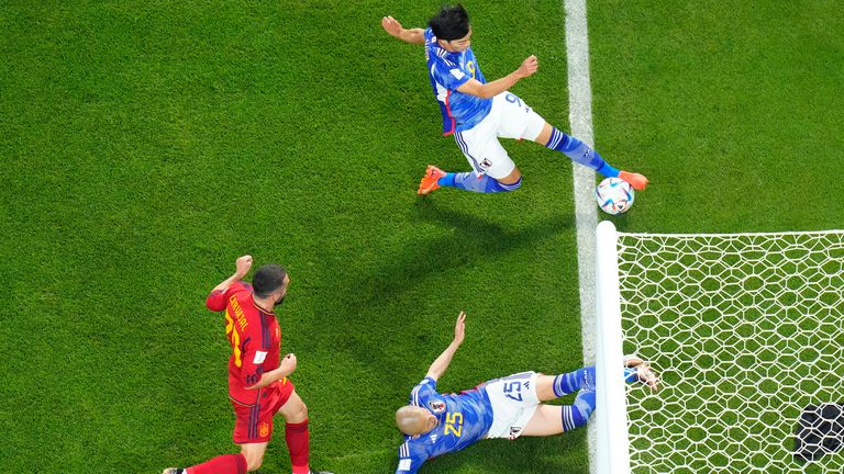 The ball appears to be over the line before Japan's Kaoru Mitoma crosses for team-mate Ao Tanaka to give them a 2-1 lead against Spain