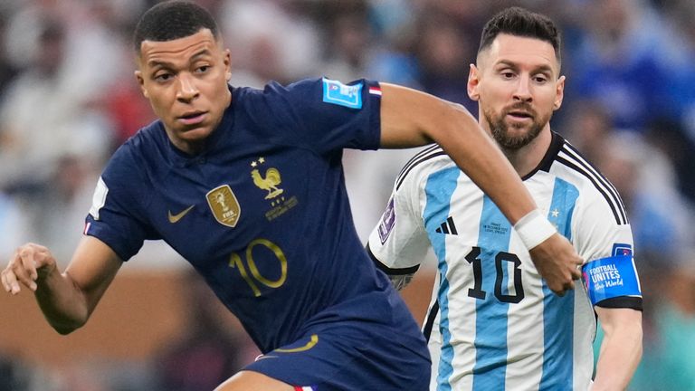 France&#39;s Kylian Mbappe and Argentina&#39;s Lionel Messi go for the ball during the World Cup final soccer match between Argentina and France at the Lusail Stadium in Lusail, Qatar, Sunday, Dec.18, 2022. (AP Photo/Manu Fernandez)