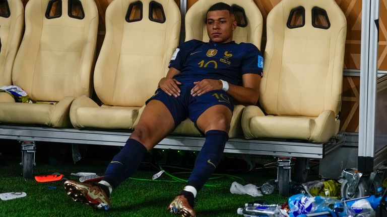 France&#39;s Kylian Mbappe sits on the bench at the end of the World Cup final soccer match between Argentina and France at the Lusail Stadium in Lusail, Qatar, Sunday, Dec.18, 2022. (AP Photo/Manu Fernandez)