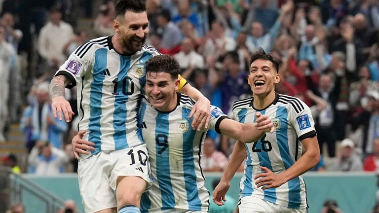 Lionel Messi and Julian Alvarez celebrate after going 2-0 up