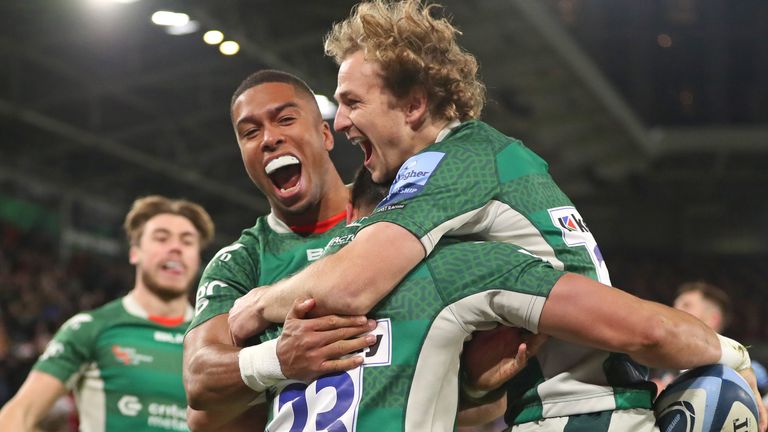 Lucio Cinti Luna of London Irish celebrates with Ben Loader (l) and Joe Powell 