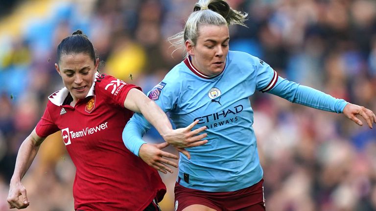Manchester United's Ona Batlle (left) and Manchester City's Lauren Hemp compete for possession
