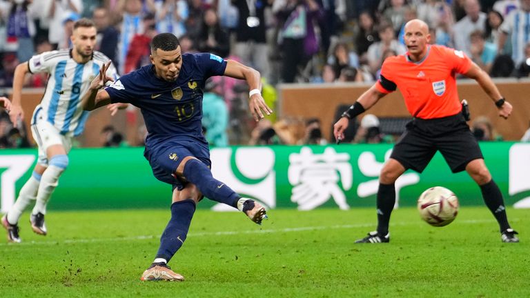 France's Kylian Mbappe scores his side's third goal during the World Cup final soccer match between Argentina and France at the Lusail Stadium in Lusail, Qatar, Sunday, Dec.18, 2022. (AP Photo/Manu Fernandez)