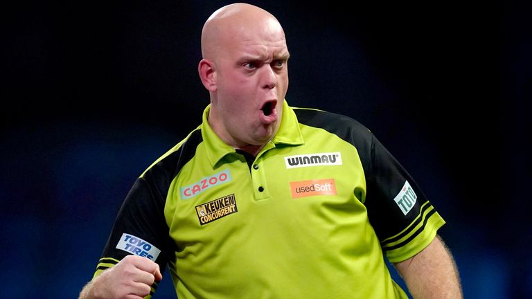 Michael van Gerwen celebrates during his victory over Lewy Williams during day seven of the Cazoo World Darts Championship at Alexandra Palace, London. Picture date: Wednesday December 21, 2022.