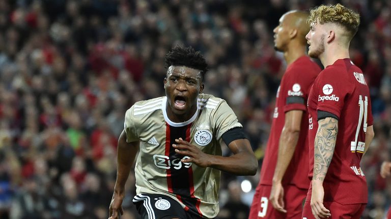 Ajax&#39;s Mohammed Kudus celebrates after scoring his side&#39;s opening goal during the Champions League group A soccer match between Liverpool and Ajax at Anfield stadium in Liverpool, England, Tuesday, Sept. 13, 2022. (AP Photo/Rui Vieira)