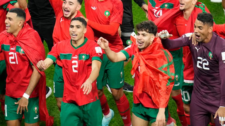 Morocco players celebrate their shootout win
