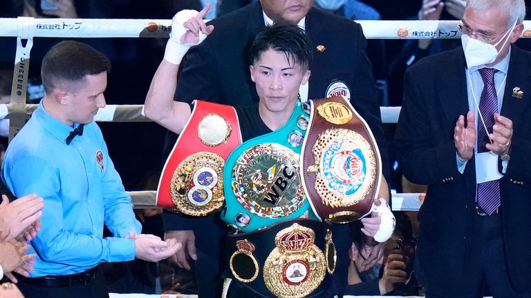 Naoya Inoue of Japan celebrates after defeating Paul Butler of Britain after their bantamweight title unification boxing match of WBA, WBC, IBF, and WBO in Tokyo, Japan, Tuesday, Dec. 13, 2022.(AP Photo/Shuji Kajiyama)