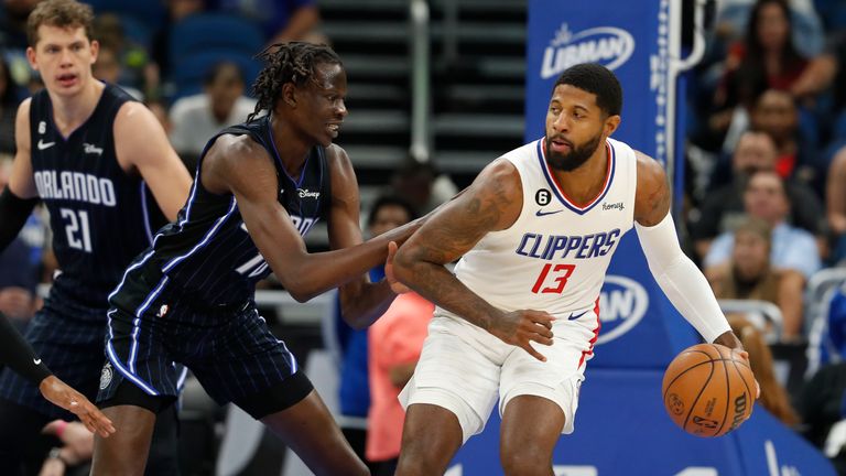 Los Angeles Clippers guard Paul George drives against Orlando Magic center Bol Bol during the first half of an NBA basketball game Wednesday, Dec. 7, 2022, in Orlando, Fla. (AP Photo/Scott Audette)


