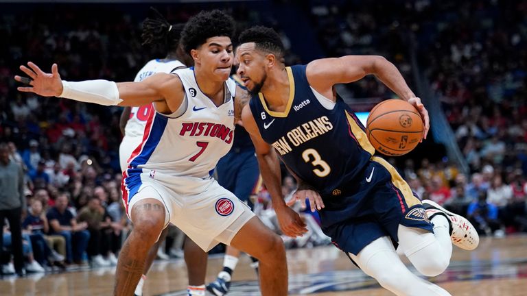 New Orleans Pelicans guard CJ McCollum (3) drives the lane against Detroit Pistons guard Killian Hayes (7) in the first half of an NBA basketball game in New Orleans, Wednesday, Dec. 7, 2022. (AP Photo/Gerald Herbert)


