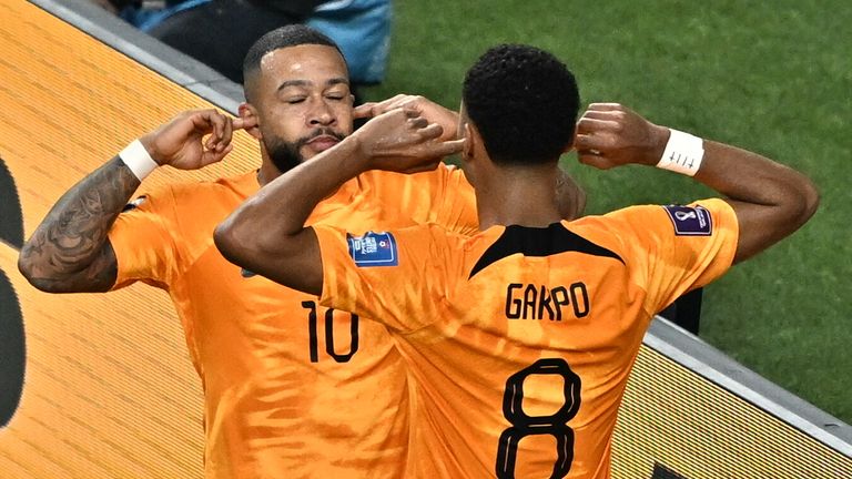 Memphis Depay celebrates with Cody Gakpo after opening the scoring for the Netherlands against USA