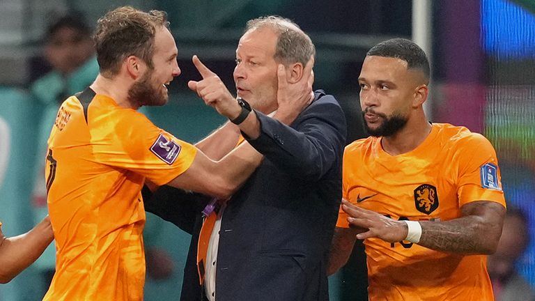 Daley Blind celebrates his goal with his father, Danny, and fellow scorer Memphis Depay