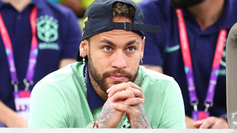 Neymar watches Brazil take on Cameroon from the stands