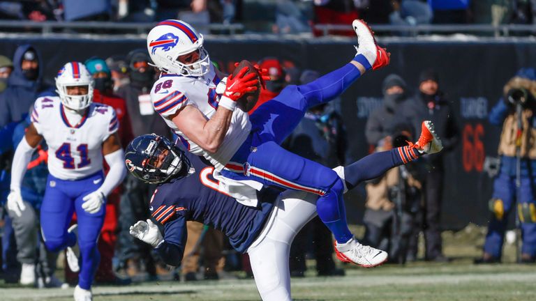 Buffalo Bills tight end Dawson Knox (88) makes a catch against Chicago Bears cornerback Kyler Gordon (6) during the first half of an NFL football game, Saturday, Dec. 24, 2022, in Chicago.