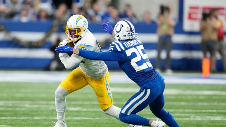 Los Angeles Chargers&#39; Keenan Allen is tackled by Indianapolis Colts&#39; Rodney Thomas II during the first half of an NFL football game, Monday, Dec. 26, 2022, in Indianapolis