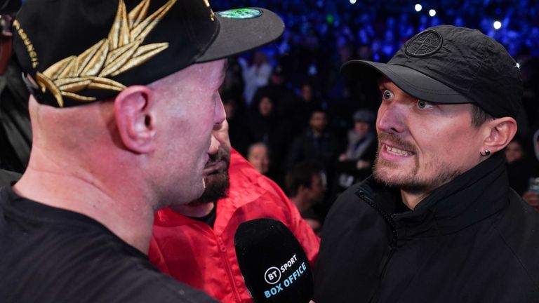 Oleksandr Usyk stares at Tyson Fury