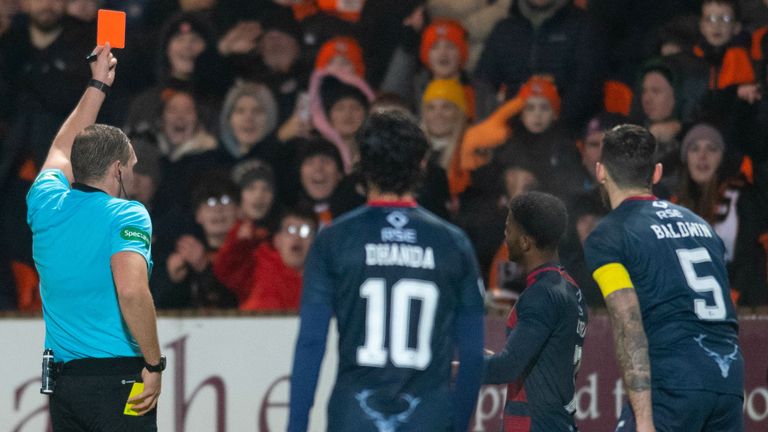DUNDEE, SCOTLAND - DECEMBER 28: Ross County's Owura Edwards is shown a red card during a cinch Premiership match between Dundee United and Ross County at Tannadice Park, on December 28, 2022, in Dundee, Scotland.  (Photo by Mark Scates / SNS Group)