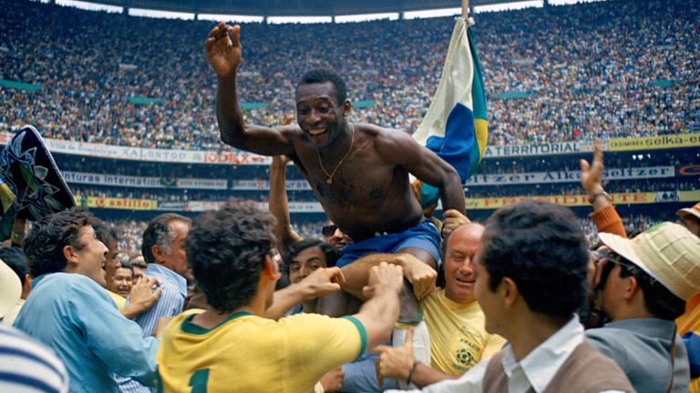 FILE - Brazil's Pele is hoisted on the shoulders of his teammates after Brazil won the World Cup final against Italy, 4-1, in Mexico City's Estadio Azteca, June 21, 1970.  Pel.., the Brazilian king of soccer who won a record three World Cups and became one of the most commanding sports figures of the last century, died in sao Paulo on Thursday, Dec. 29, 2022. He was 82. (AP Photo, File)
