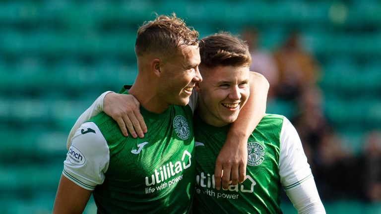 EDINBURGH, SCOTLAND - AUGUST 28: Hibernian's Ryan Porteous (L) and Kevin Nisbet celebrate at full time during a cinch Premiership match between Hibernian and Livingston at Easter Road, on August 28, 2021, in Edinburgh, Scotland (Photo by Ross Parker / SNS Group)