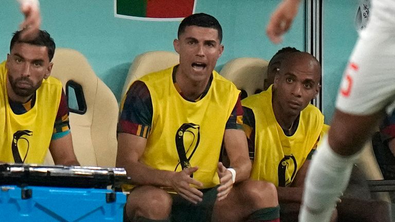 Cristiano Ronaldo encourages his Portugal team-mates from the bench