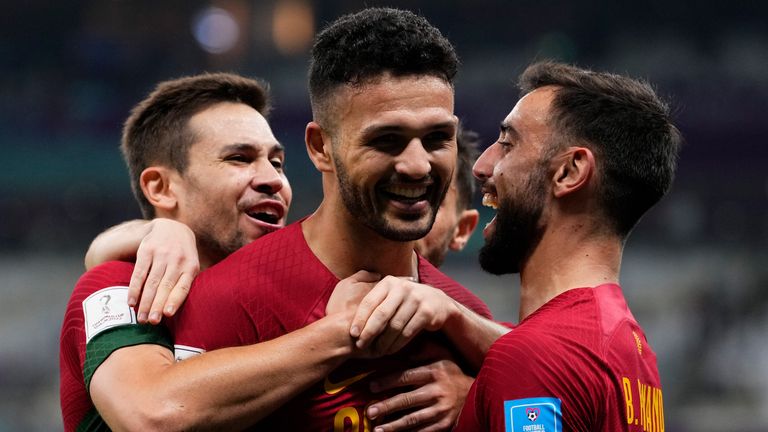 Goncalo Ramos is mobbed by his team-mates after scoring for Portugal