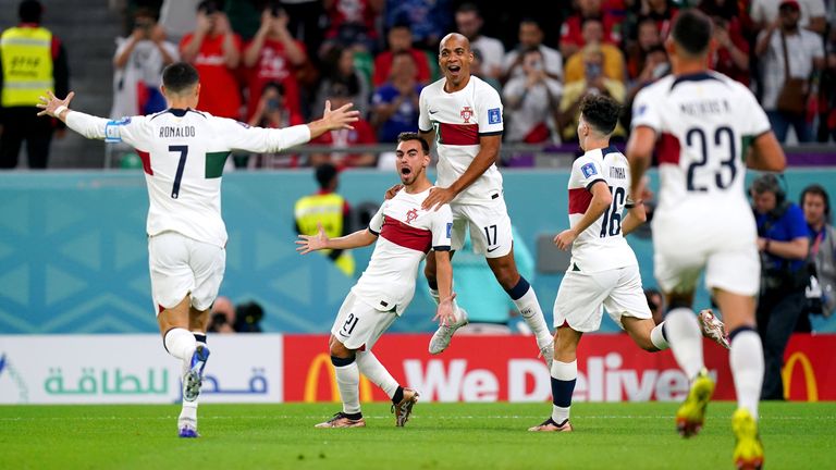 Portugal's Ricardo Horta (centre left) celebrates with his team-mates after scoring